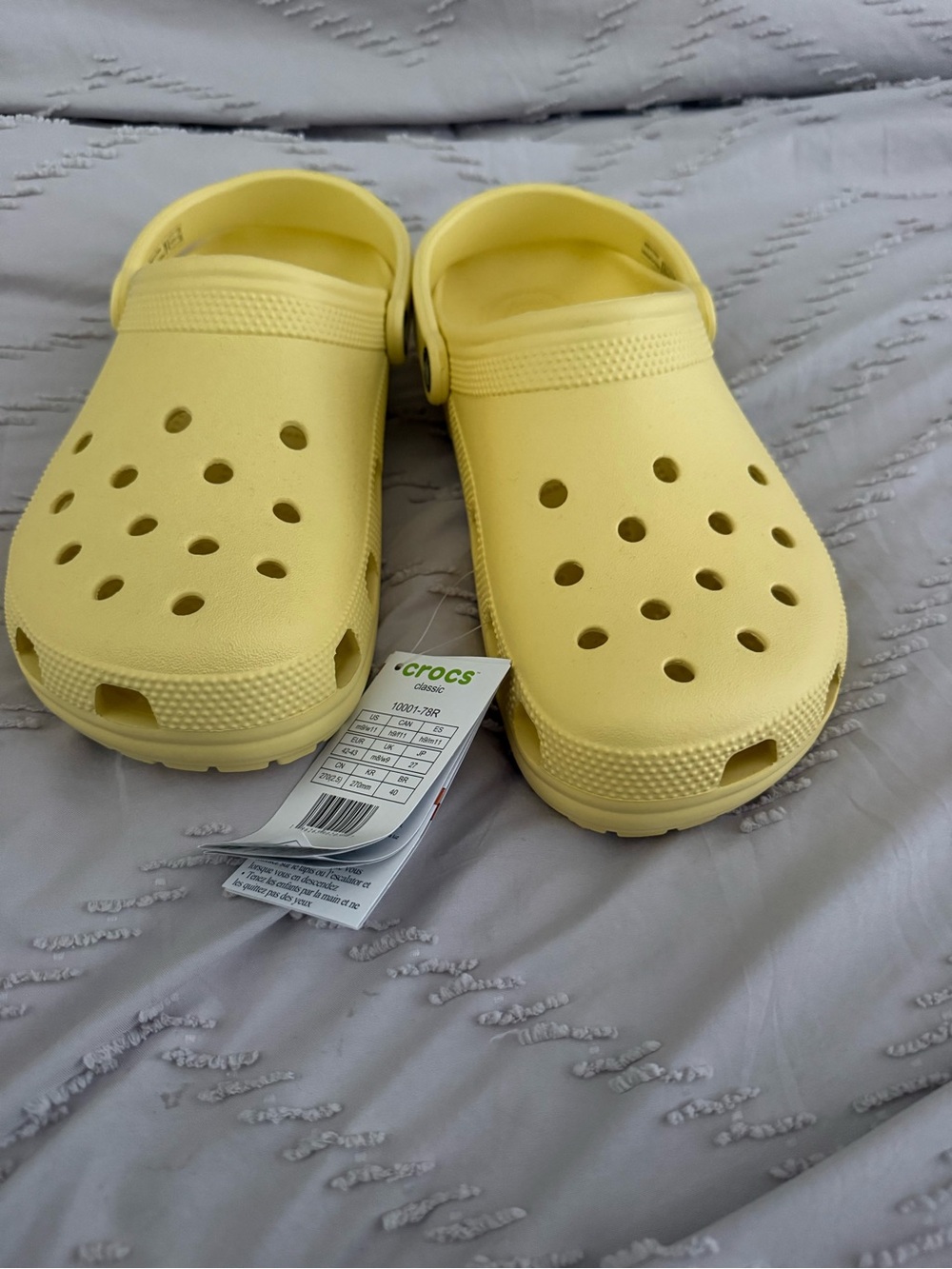 NWT Crocs Classic Shoes in Pale Yellow